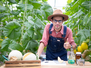 Scientist or microbiologist test and develop oganic bio product from melon.