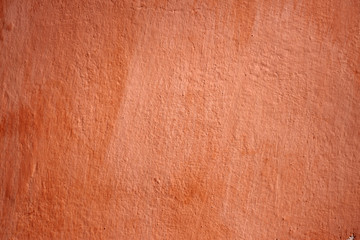 Abstract orange background texture rare vintage cement wall.  