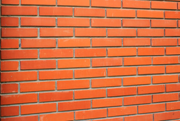 Red, brown brick wall textured background