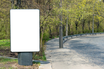 Vertical blank white billboard with place for text or mock up.