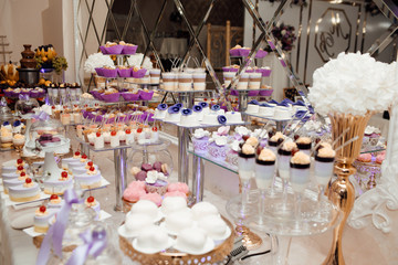 Delicious wedding reception candy bar dessert table