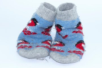 Colorful handmade sock, Knitted wool socks on a white background.