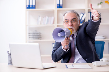 White bearded old businessman employee unhappy with excessive wo