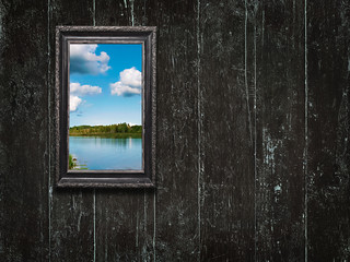 Old wooden frame on vintage  wooden background