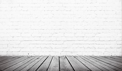 table over white  brick wall