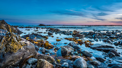 Seascape lighthouse coastal shoreline images of Cape Island, Nova Scotia Canada.
