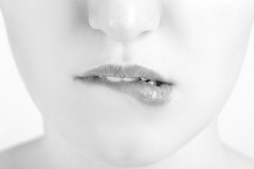 woman biting lips