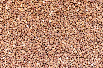 Dark Buckwheat texture high-quality photo background of buckwheat groats