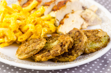 Selective Focus on Fried Green Tomatoes with Pork and Mac and Cheese