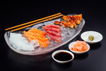 Small fillets of salmon, tuna, cuttlefish, and eel completely fresh and ready to eat