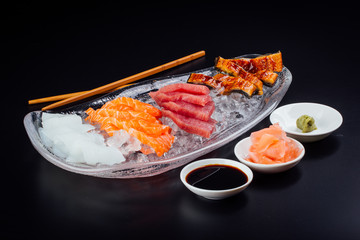 Small fillets of salmon, tuna, cuttlefish, and eel completely fresh and ready to eat