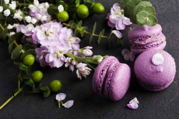 Purple macarons and flowers
