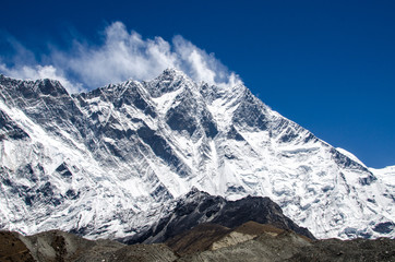 Front view of south face wall of Lhotze mountain in Nepal. Himalayas.  8516 meters above the sea. Covered by clouds. 