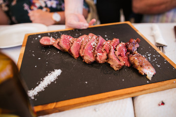 Family enjoy beef and wine good on a holiday