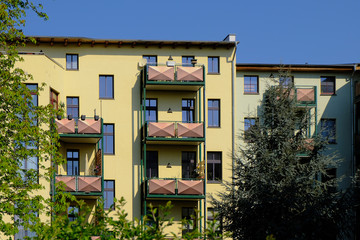 colorful apartment building with balconies in the countryside
