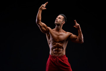 Fototapeta na wymiar Handsome Muscular Men Flexing Muscles