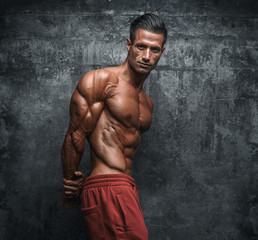 Fototapeta premium Handsome Muscular Men Flexing Muscles