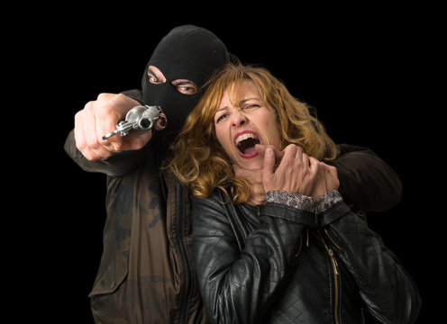 Escena violenta con reh&eacute;n