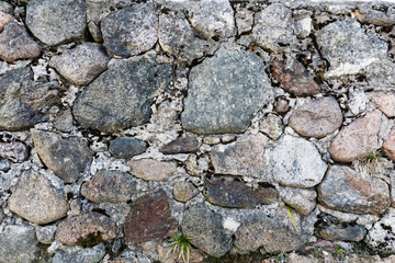 old textured and aged stone wall background