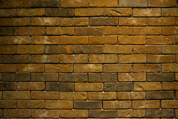 old yellow and brown brick wall, texture pattern, background