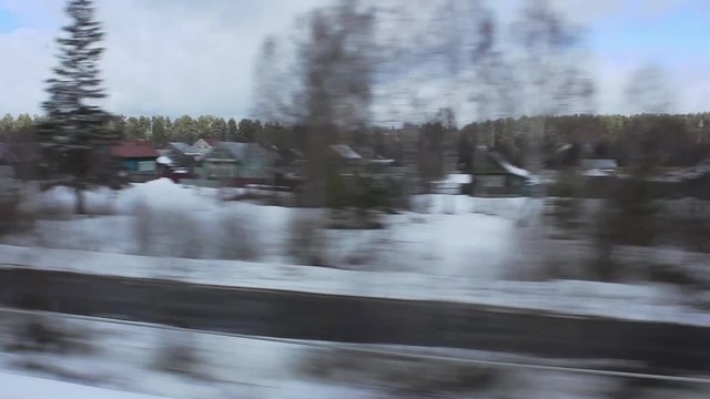 Winter view from the window of the fast train