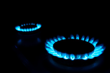 gas burning in domestic stove, natural resource concept dark