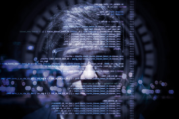 virtual binary computer code in front of young mans face b