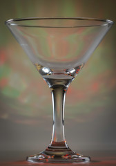 Martini Glass with flashing bright green and yellow lights on background