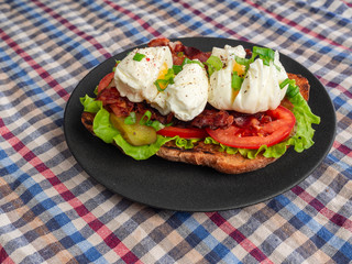 Toast with bacon, tomato ,pickle and boiled eggs