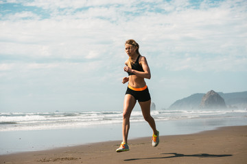 Woman working out on beach