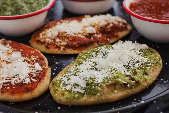 mexican tlacoyos with green and red sauce, Traditional food in Mexico