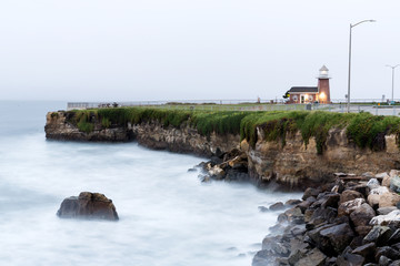 Fototapeta na wymiar Lighthouse in Santa Cruz before sunrise long exposure