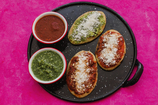 mexican tlacoyos with green and red sauce, Traditional food in Mexico