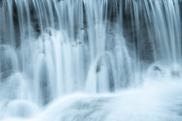 Plakat beautiful view of waterfall. Subject is blurry.