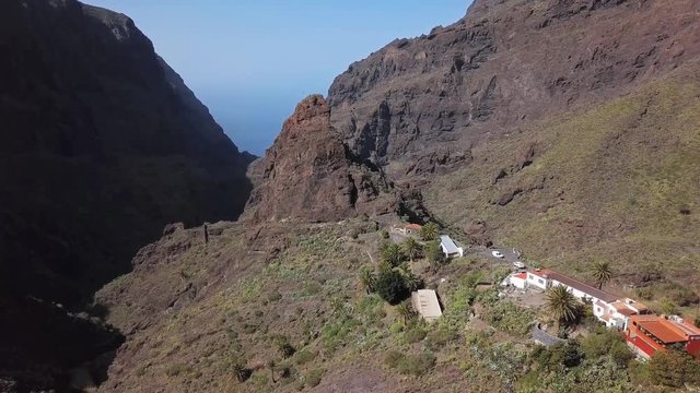 Flight over of famous Masca Canyon and mountain village on Tenerife island, Canary Islands, Spain