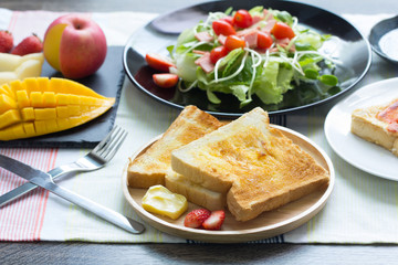 Breakfast, toast and vegetable salad with fruit