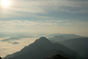 scenic mountain lined with alternates. The morning sun shines and fog covered the mountain. Doi KALHEPU, Mae Moei, Tak in Thailand