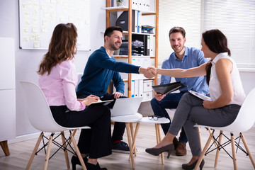 Business People Handshake In Office