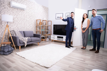 Realtor Showing New House To Customer