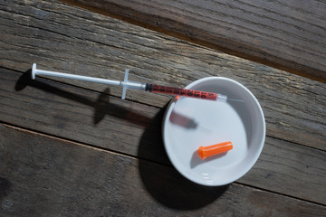 hypodermic needle full of vitimin B12