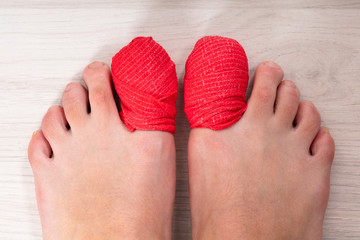 Bandage Around A Sore Toe Nail
