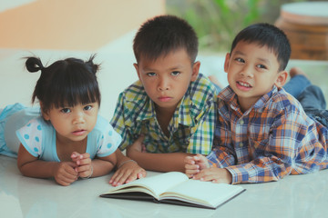 Children who are interested in staring at books.