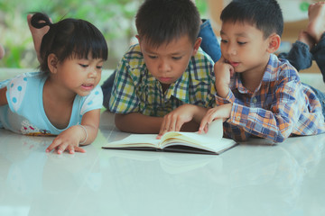 Children who are interested in staring at books.