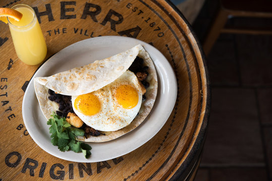 Tex mex breakfast with fried eggs