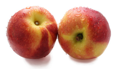 Ripe solid peach isolated on a white background with clipping path