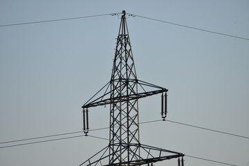 power pylons in germany on a sunny morning