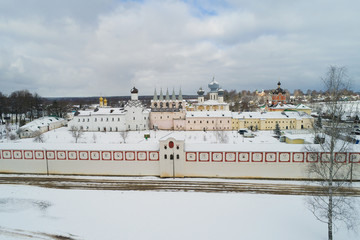 The old Tikhvin  Uspensky monastery in the March afternoon (shooting from the quadcopter). Tikhvin, Russia