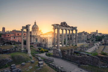 Naklejka na ściany i meble Ruins of Roman's forum at sunrise, ancient government buildings , temple and shrine of Roman empire