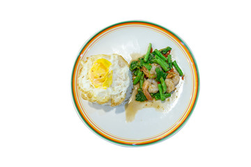 Thai Style Stir fried Spicy shrimp with Thai Holy Basil and Lentils on white background, focus selective.