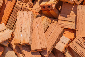 A stack of new red facing bricks.Construction,improvement